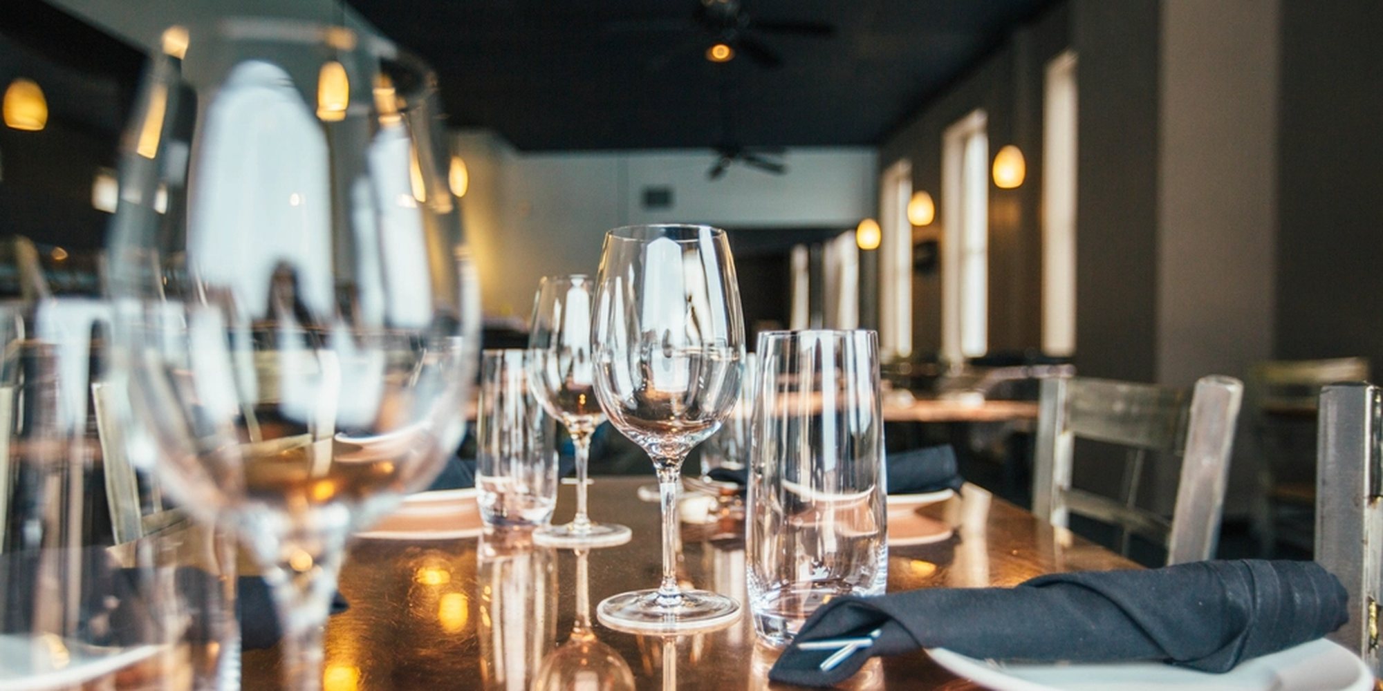 The dining room at Nine Mile, tables set for evening service